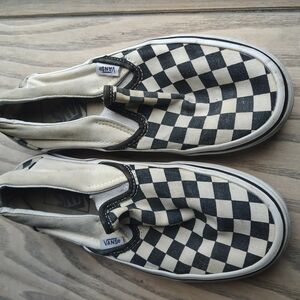 Vans Black and White Canvas Slip-On Sneakers